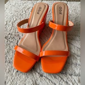 Orange wedge heels 🍊